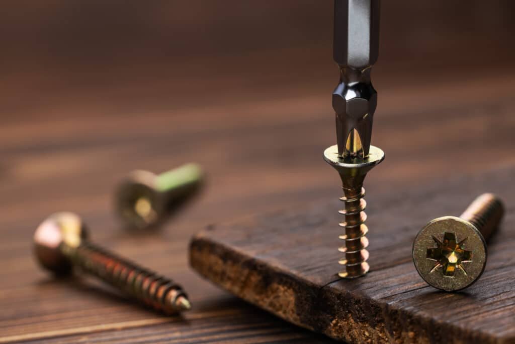 Custom deck screws with corrosion resistant coating for outdoor construction