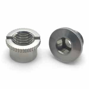 Workers machining custom nuts in a China factory